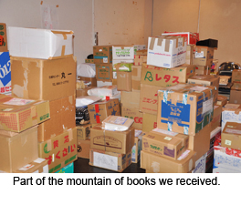 みなさまからお送りいただいた本。開梱前の箱の山です。